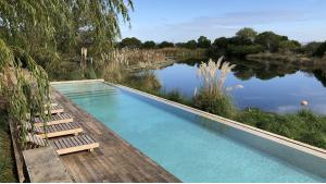 7-Hectare Lagoon Front Estate located in La Barra, Punta del Este, Uruguay, listed by Curiocity Villas.