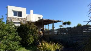 Beachfront Charming Villa  located in Jose Ignacio, Punta del Este, Uruguay, listed by Curiocity Villas.